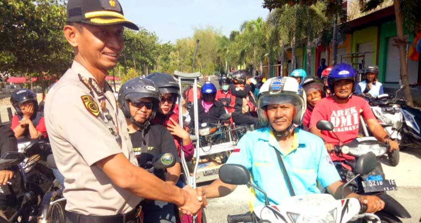 Polres Bagikan Puluhan Doorprize ke Penyandang Disabilitas Lamongan, Anniversary DMI ke-3